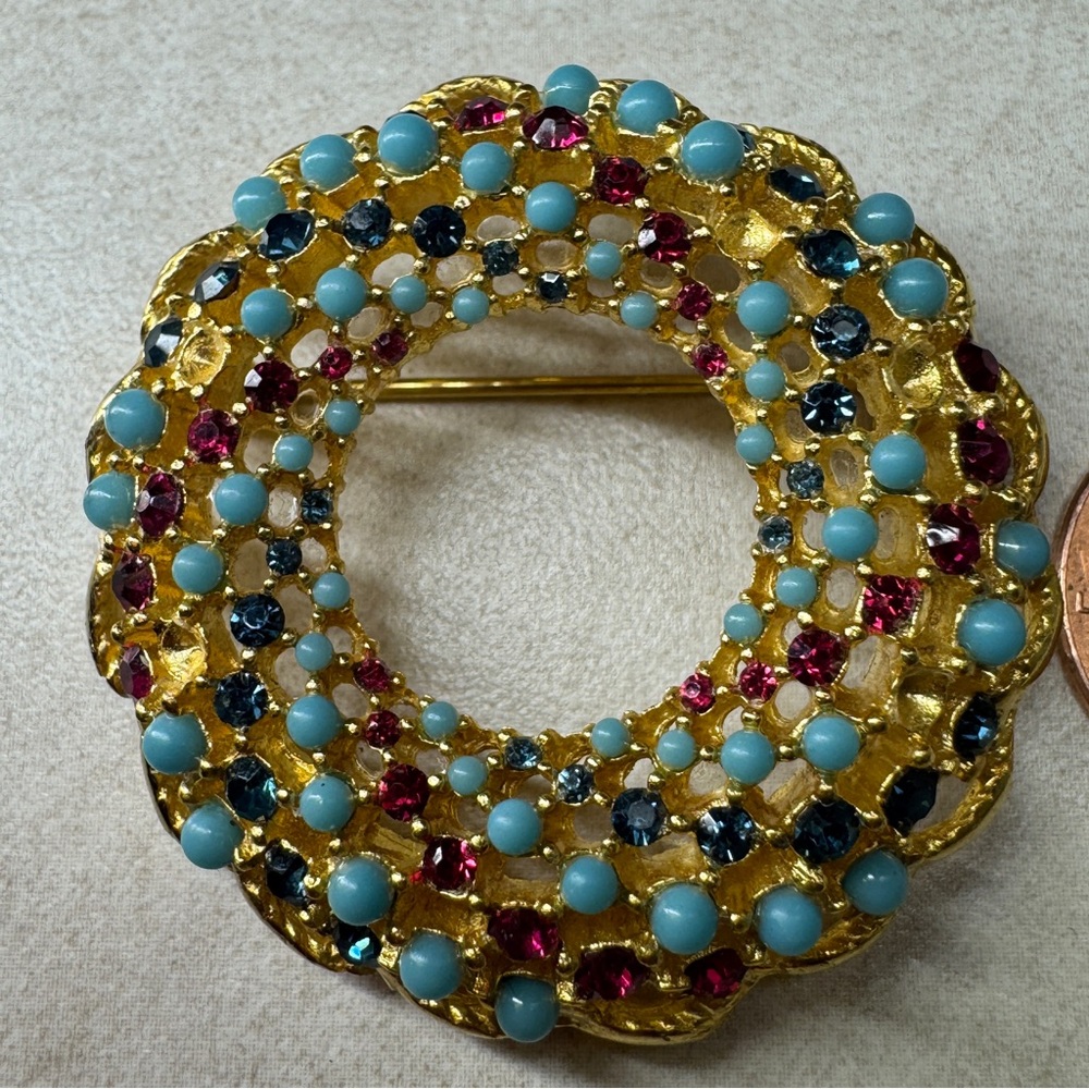 Sarah Coventry Gold Tone Brooch with Blue and Red Gems